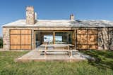 Outdoor, Stone, Wood, Concrete, Back Yard, Pavers, Large, Grass, and Hardscapes  Outdoor Hardscapes Grass Concrete Wood Photos from Slow Down Time at This Zero-Energy Holiday Rental in Northern Spain