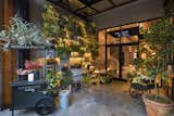 Guests enter the hotel through the Putnam &amp; Putnam Flower Shop, meant to be a "botanical library" of sorts with planter boxes climbing a 15-foot wall. It’s the first retail space for owners Darroch and Michael Putnam, a couple whose clients include Gwyneth Paltrow and Bergdorf Goodman.