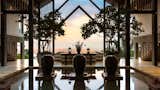 Villa Samira in Kathu, Thailand, offers panoramic views of the Bay of Bengal. Inside is a reflection pond with stepping stones and an oversized jacuzzi. Just 4 miles away is quiet Kamala Beach.