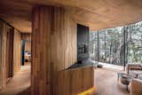 Offset planks of wood lend texture to interior walls.