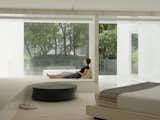 The master bedroom includes a table by Poliform.