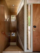Joseph and Louise Marlow Lloyd M. Joshel House brick and wood staircase