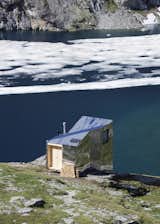 Accessible only by foot, the On Mountain Hut is sited on Piz Lunghin, or “the roof of Europe,” the continent’s only triple watershed. Water here flows into the Danube, Rhine, and Po rivers.