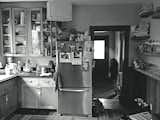 The previous kitchen was cramped and isolated from the rest of the house.  Photo 4 of 16 in A 1901 Craftsman in Seattle Gets a Svelte Cantilevered Addition