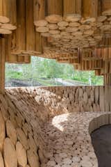 Titled Xylem, Diébédo Francis Kéré’s 2,100-square-foot pavilion at the Tippet Rise Art Center in Montana is made of lodgepole pine logs from standing-dead trees that were taken down to prevent fires.