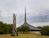 University of Tennessee, Knoxville professor Marshall Prado conceived this 30-foot carbon fiber tower that references the spire of Eero Saarinen's North Christian Church behind it.