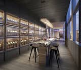 A wine tasting area offers temperature-controlled storage for dozens of bottles. 