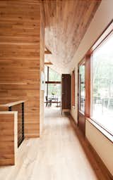 Walls, ceilings, and floorings are clad in warm white oak sourced from a small mill in Pennsylvania.