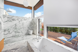 Reportedly, it took eight slabs of marble to achieve the seamless look Mossman imagined. In the interview with AD, she said, "I also didn’t want any rust in them. I liked the graphic gray and white."