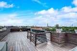 The home offers two private outdoor areas, including a spacious rooftop terrace with views of the downtown Chicago skyline.