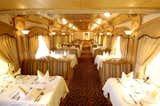 In the Deccan Odyssey’s restaurant carriage, which is decorated in carved wood and vibrant textiles, traditional Indian fare is served.
