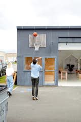 Playfulness is a big part of the office atmosphere.  Here, Wilkins and Paterson take a basketball break.