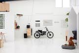 A variety of message display systems enliven the warehouse wall, which also provides parking space for an employee’s motorcycle. “It looks nice there.  It’s white and it fits,” says co-founder Will McCallum.