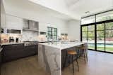 Lea Michele’s Brentwood home kitchen with marble island
