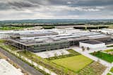 Powered by solar energy and punctuated by skylights, the JLR Advanced Product Creation Center is a comfortable and efficient workspace for 13,000 engineers and designers.