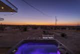 Once the sun sets for the day, incredible stargazing can be viewed from the hot tub.  Photo 9 of 9 in This Funky Desert Hideaway Near Joshua Tree Just Listed for $285K
