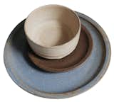 Wave Bowls and assorted dinner plates from Era Ceramics of Austin, Texas