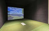 The golf simulator offers a spot to practice for rounds at the neighboring Glenwild Golf Course.