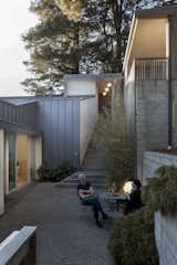 The entry courtyard opens to the living and dining areas.