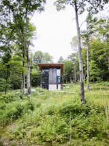 Just outside Stowe, Vermont, the Barr family cabin, designed by architect Tom Kundig, sits on a hillside overlooking a dense landscape of maples, Scotch pines, and ferns. Kundig wrapped two of the cabin’s three stories in Cor-Ten steel, a signature material for the designer.