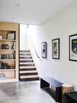 The staircase in the mudroom is made of raw steel kickplates and treads created from locally harvested sugar maples.