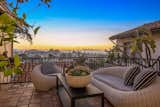 Secluded terraces provide idyllic settings for entertaining while enjoying far-reaching views that span from West Hollywood to downtown L.A.