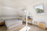 A look at the master bedroom, which is brightened by two skylights.