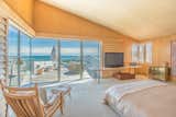 Upstairs, the master suite offers mesmerizing views of the Atlantic, which can be seen from both inside the room and outside on a private sun deck.