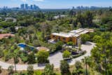 Exterior, House Building Type, Flat RoofLine, Concrete Siding Material, and Wood Siding Material Designed by Richard Meier in 2016, the Foothill Estate is currently owned by entertainment executive and L.A. Olympics Organizing Committee head Casey Wasserman. The six-bedroom home sits on a verdant 3.25-acre lot, just a short drive from Sunset Boulevard.  Photos