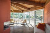 Plenty of light floods the interiors, but can be mitigated or invited by the patio’s rotating awnings.  Photo 7 of 16 in This Rare Midcentury Home Will Be Preserved Forever—and Now You Can Spend the Night