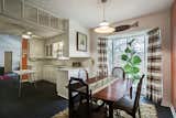 A closer look at the dining room, which features a bay window overlooking the backyard.