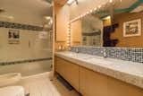 A large walk-in shower and dual vanities are two highlights of the master bathroom.