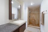 The master bathroom was recently updated with all new cabinetry and finishes.