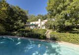 A large pool sits at the back of the property, tucked away from the already quiet neighborhood.