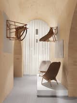 Barrel vaulted ceilings in Doshi Levien’s installation evoke the spirit of traditional cathedrals.