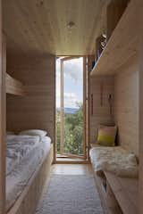 A child’s bedroom has built-ins designed by Casper and Lexie and fabricated by Strønes Snekkerversksted.