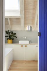 A sink by Duravit sits in the bathroom with a pan faucet by Zuchetti.