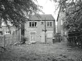 Before: the back of the home  Photo 2 of 16 in A Bare-Bones Brick Home in London Has Its Breakthrough Moment