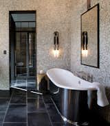A deep soaking tub makes for a luxe retreat.