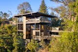 The home’s three stories descend down a tree-filled canyon lot that offers a private and quiet escape from the city below.