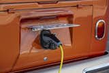A charging socket nests under the license plate. The battery can be charged with a household socket, or at quick-charge stations. Depending on the power source, it can reach an 80% charge in just 40 minutes.&nbsp;