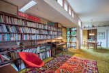 Completing the living room is another row of bookcases, built to house Dr. and Mrs. Goldberg's extensive book collection. A long row of clerestory windows bring additional natural light into the space.