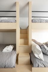 A look at the dorm-like sleeping area, complete with custom bunks to accommodate six guests.