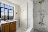 A look at one of the three bathrooms, this one complete with an oversized marble shower.