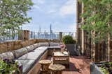 Here, the east-facing terrace also provides views of midtown and downtown Manhattan.