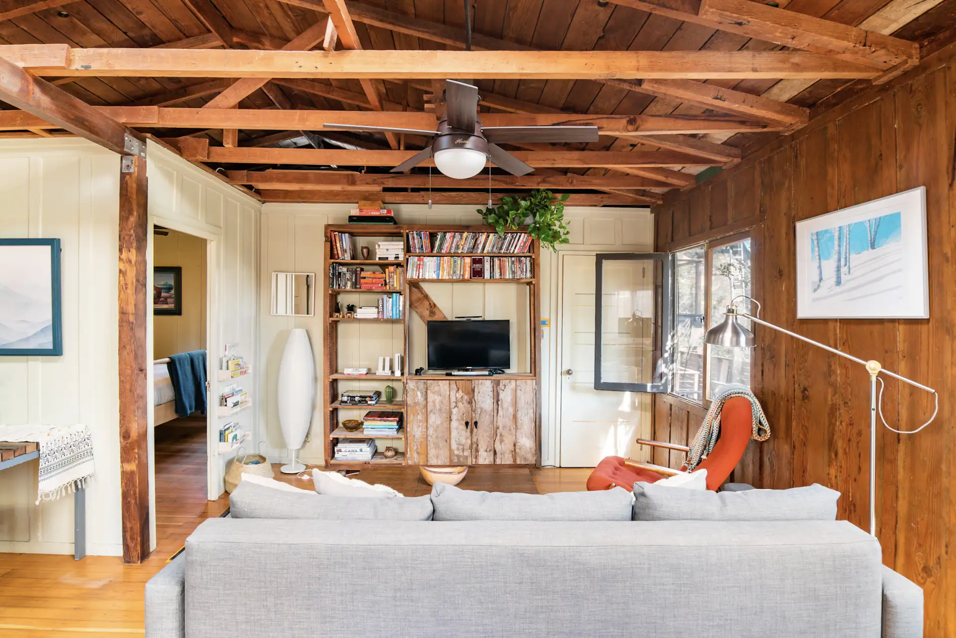 A peek into the second cottage reveals many of the same features. Uniquely, this structure also offers a 'bonus area' and second bathroom on the lower level.