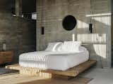 The bed linens are from Luuna and the pendants were designed by Claudio Sodi.