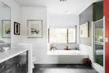 Both of the two bathrooms have been remodeled. In addition to Grohe fixtures and white Caesarstone counters, the master bathroom also includes a soaking tub.