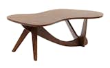 A handmade coffee table—designed by José Zanine Caldas—calls to mind tree canopies with its asymmetrical shapes. It’s available in multiple woods to match your favorite forest.&nbsp;