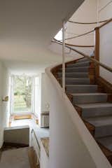 The final stop on the staircase leads up to the private sphere. "The stair leads straight up to two rooms, the study and salon, which are concealed from the living room but closely connected to it," said Frank.